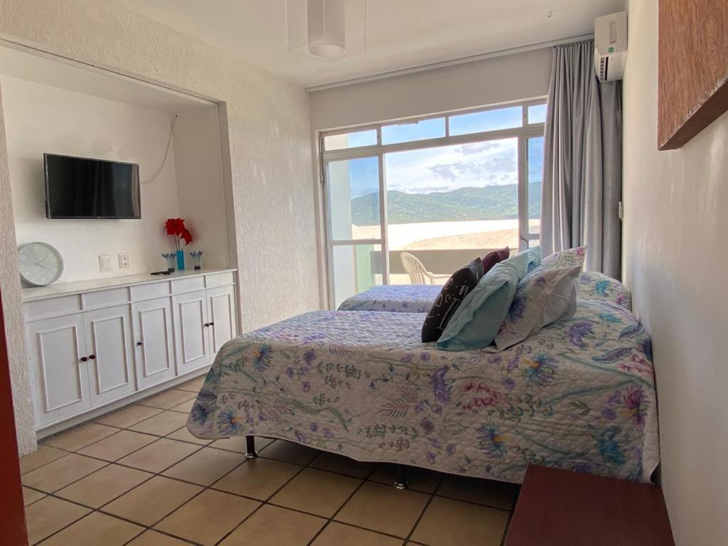 Pousada Das Dunas Via Praia Apart Hotel Florianópolis Quarto foto